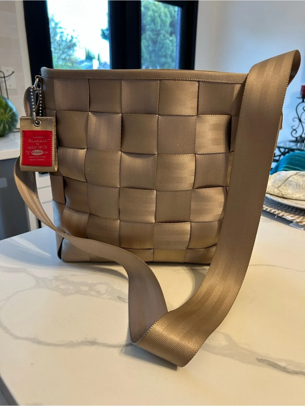 Harvey’s The Original Crossbody Shoulder Bag - Taupe. 13” x 11” x 4”